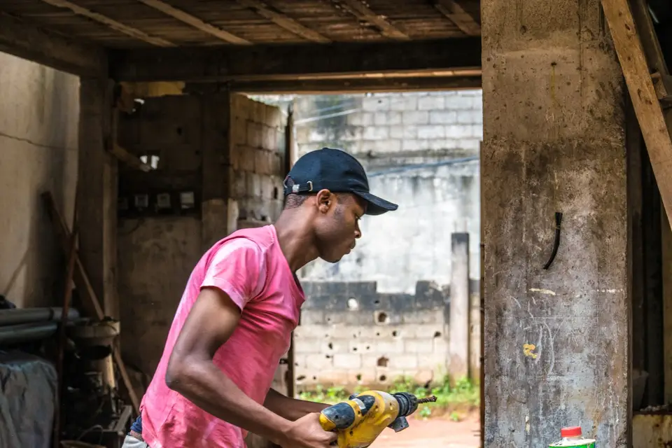 Plumber assembling and fitting water pipes